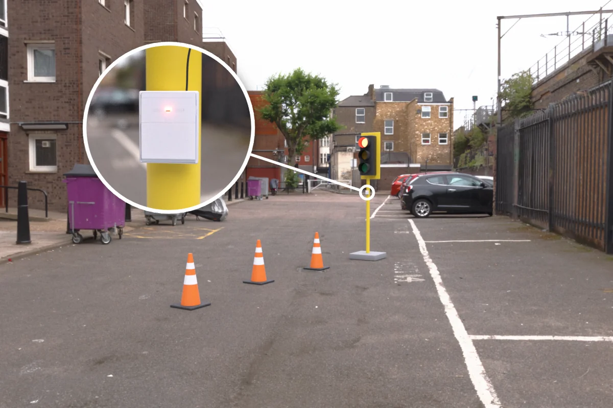 Road works temporary traffic light with CS-732F wireless remote receiver mounted on the pole, signals switched by remote control