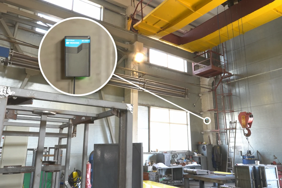 Factory 5-ton overhead crane bay with RD-710F-433 rolling door remote controller on the column for wireless crane control signals