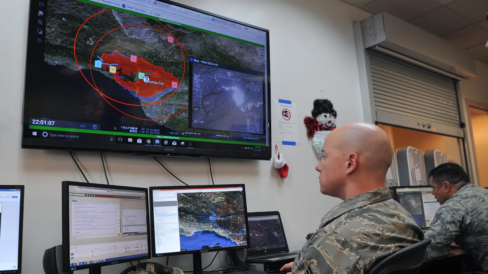 Operations center watching live video and maps